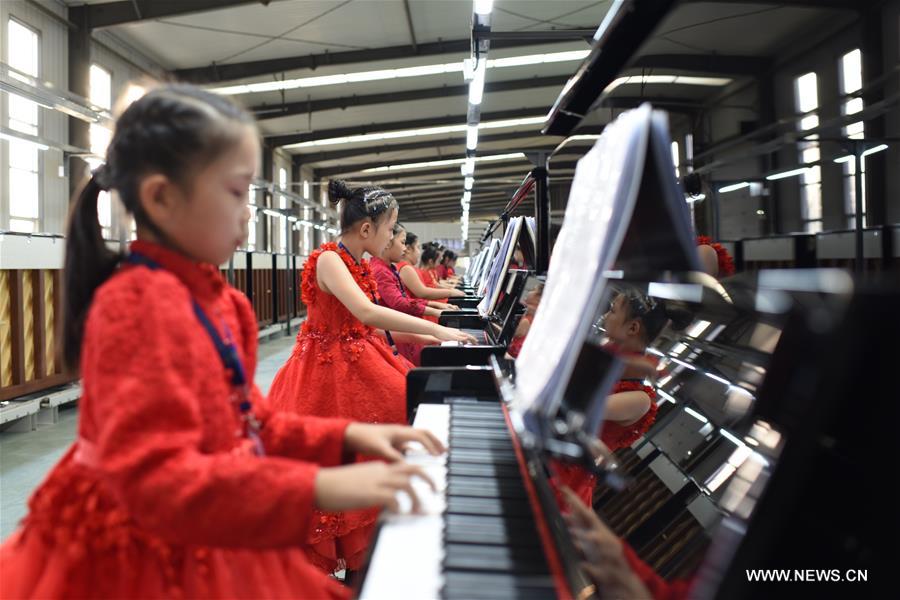 بمشاركة 666 بيانو.. الصين تكسر الرقم القياسي لسجل 