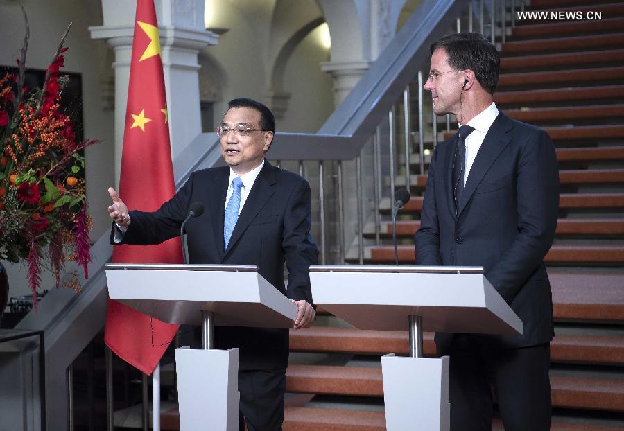 الصين وهولندا يحثان على دعم التجارة الحرة إزاء الحمائية