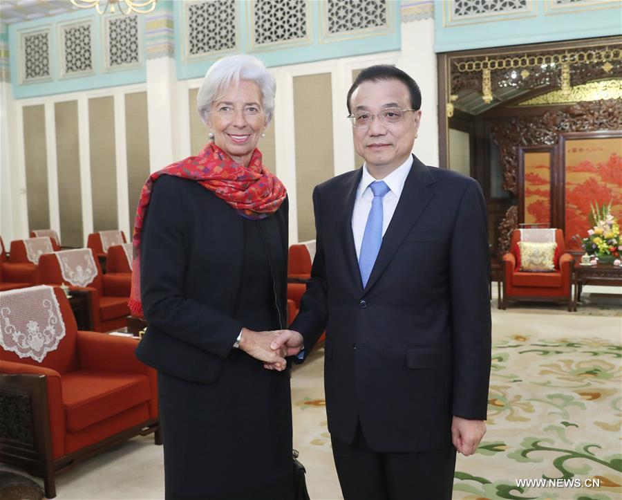 رئيس مجلس الدولة الصيني يلتقي بمديرة صندوق النقد الدولي