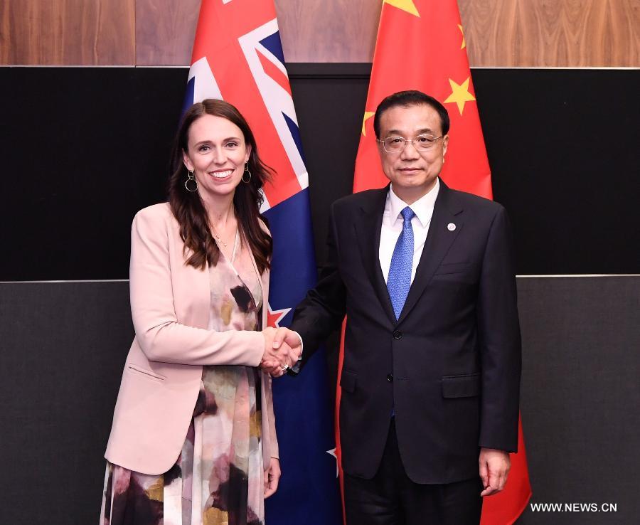 الصين ونيوزيلندا تعتزمان الارتقاء بجهود تحديث اتفاقية التجارة الحرة