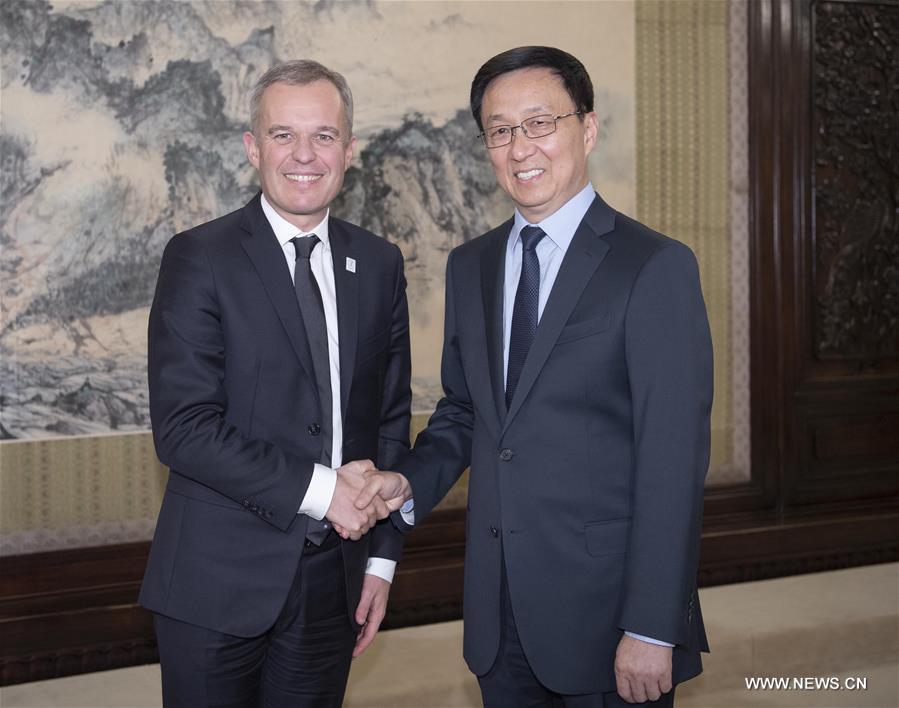 الصين وفرنسا تتعهدان بدعم التعاون البيئي