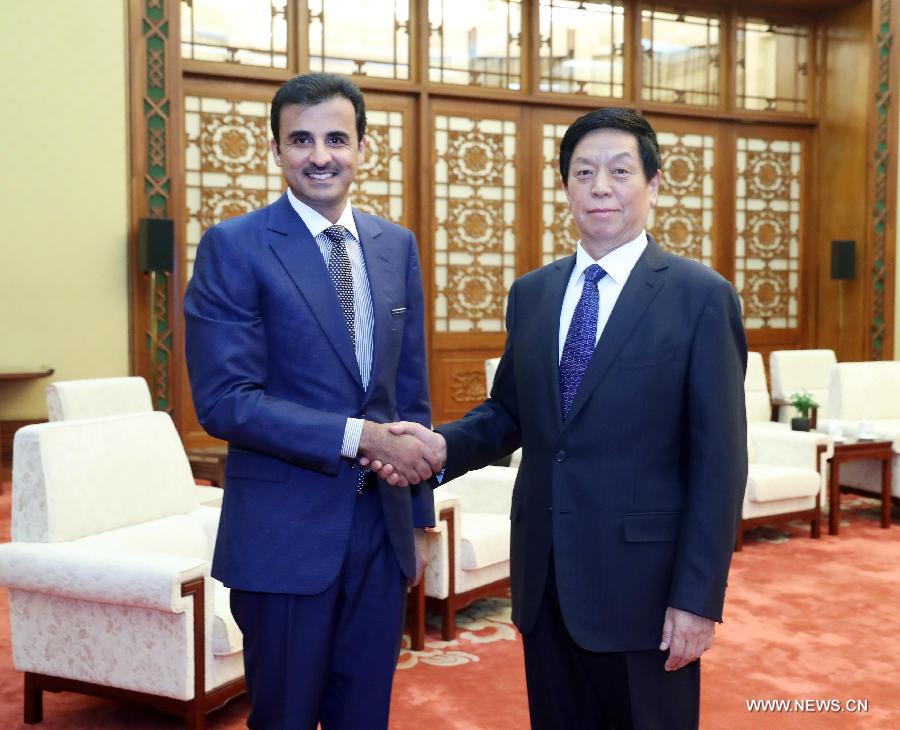 كبير المشرعين الصينيين يلتقي أمير قطر