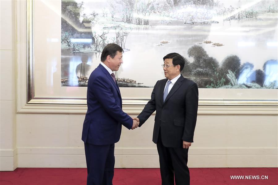 الصين وطاجيكستان تتعهدان بدعم التعاون الأمني