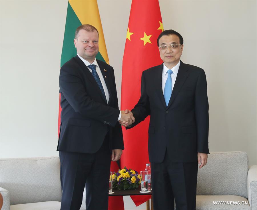 الصين وليتوانيا تعززان التعاون العملي