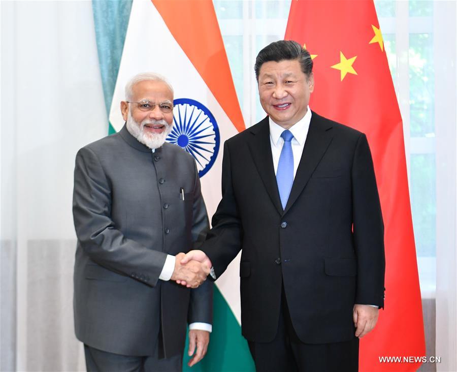 تقرير إخباري: الصين مستعدة لتعزيز الجهود مع الهند من أجل شراكة تنموية أوثق