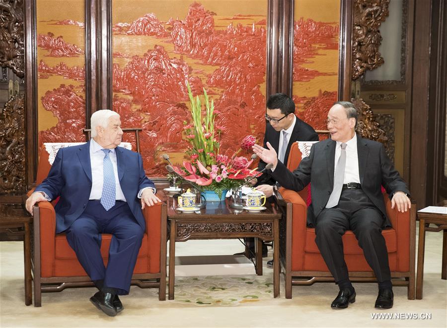 نائب الرئيس الصيني يجتمع مع نائب رئيس الوزراء السوري الزائر في بكين