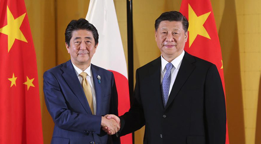شي وآبي يتفقان على بناء علاقات صينية-يابانية وفقا لحاجات العصر الجديد