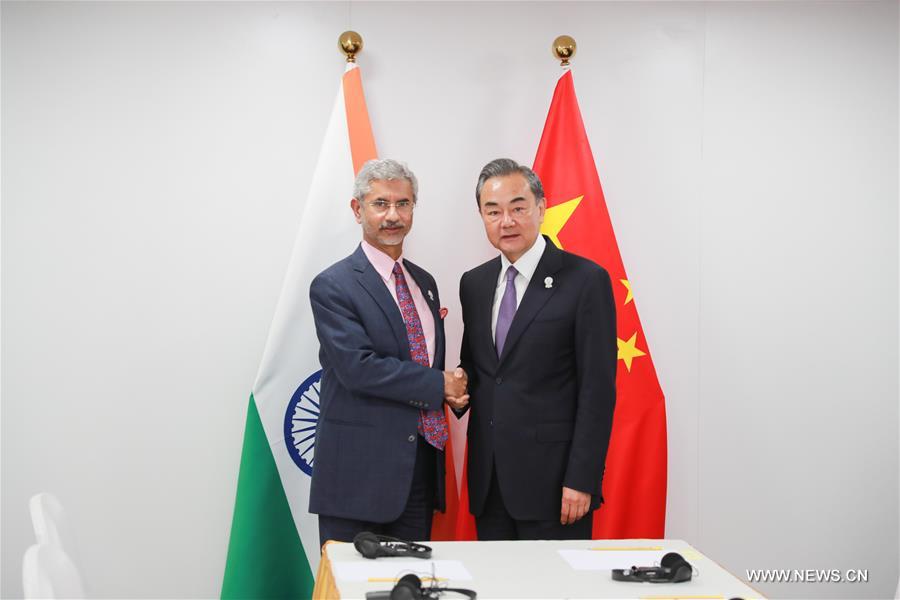 تقرير إخباري: الصين تتعهد بتعميق العلاقات مع الهند وبروناي