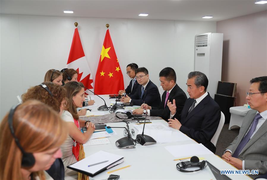 تقرير إخباري: وزير الخارجية الصيني يلتقي وزراء خارجية ماليزيا ومنغوليا وتيمور الشرقية وكندا وأستراليا