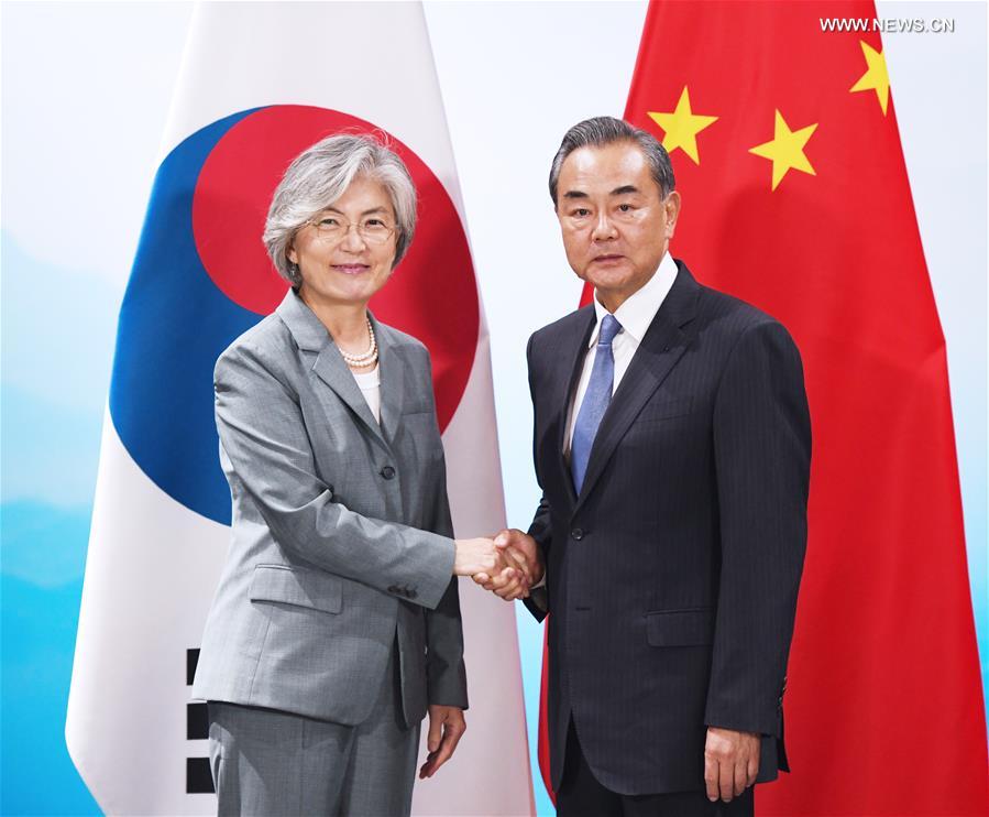 الصين وجمهورية كوريا تتعهدان بتعاون أوسع