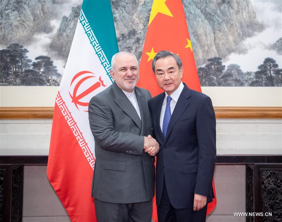 وزير الخارجية الصيني يلتقي نظيره الإيراني