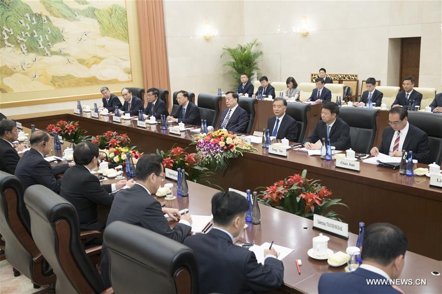 كبير المستشارين السياسيين الصينيين يلتقي وفود من كوريا الديمقراطية وفيتنام ولاوس