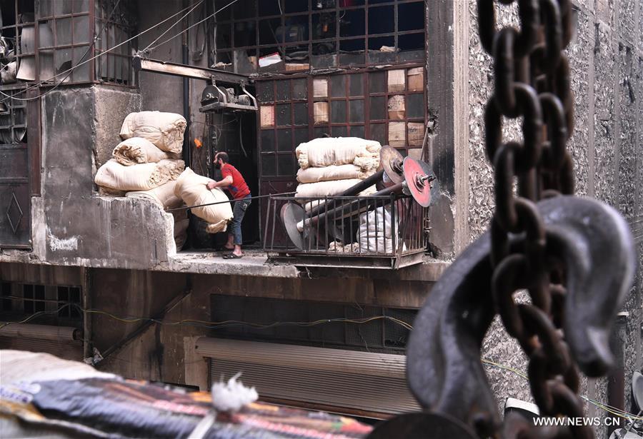 تحقيق إخباري : ورشات في حلب القديمة تعمل رغم الدمار