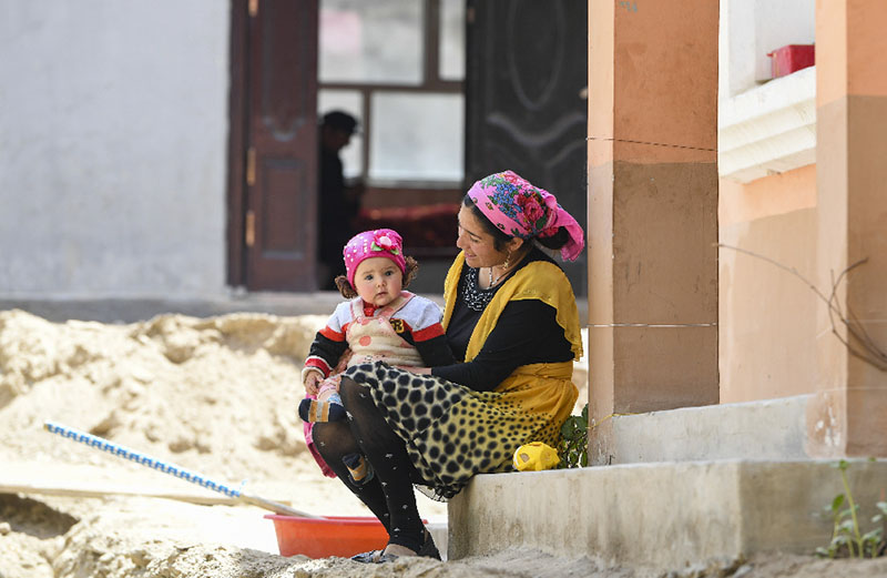 إعادة توطين قرابة 170 ألف شخص من مناطق فقيرة ونائية في شينجيانغ بشمال غربي الصين