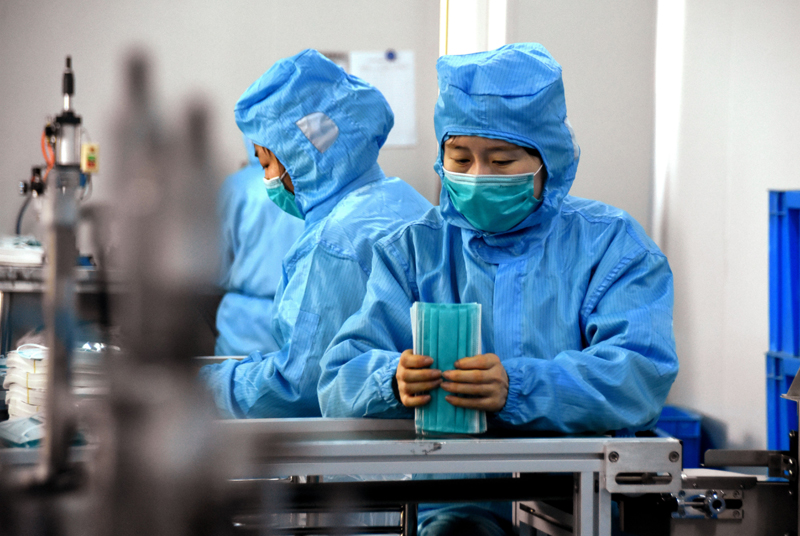 شانغهاي تنتج مليون كمامة يوميا لمكافحة فيروس كورونا الجديد