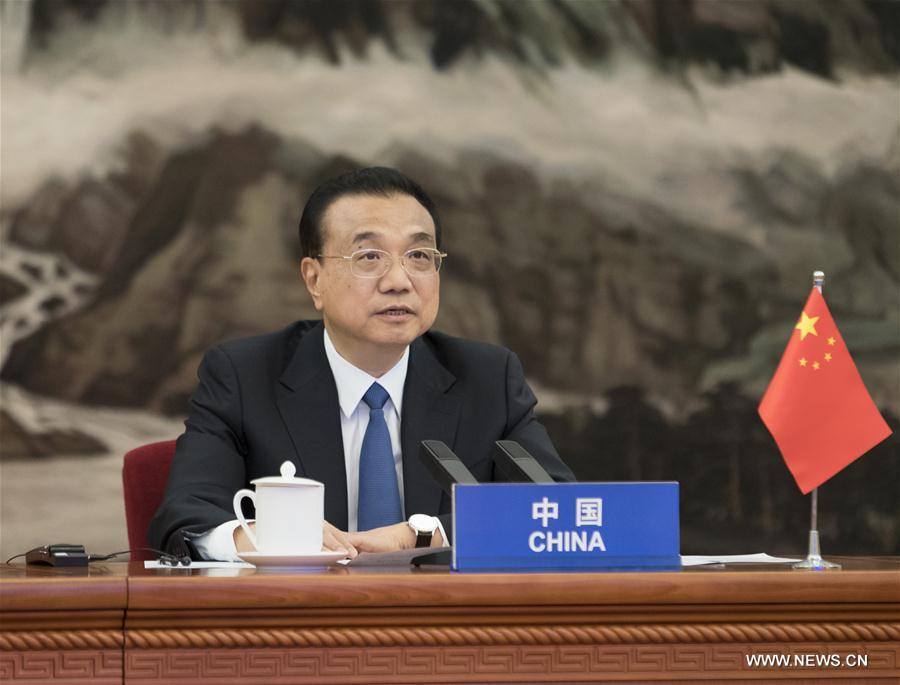 رئيس مجلس الدولة الصيني يشدد على بذل جهود مشتركة لتحقيق نصر مبكر ضد 