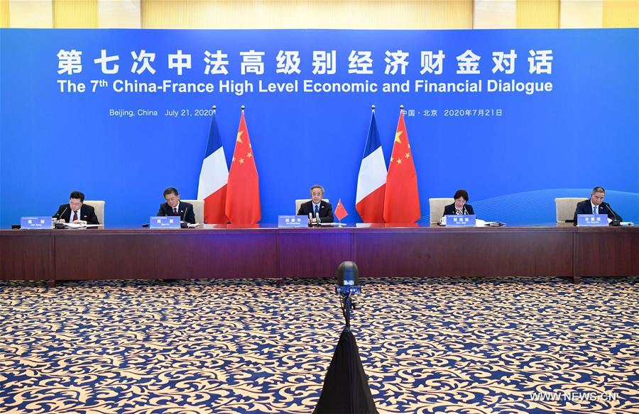 الصين وفرنسا تتعهدان بتعزيز التعاون الثنائي