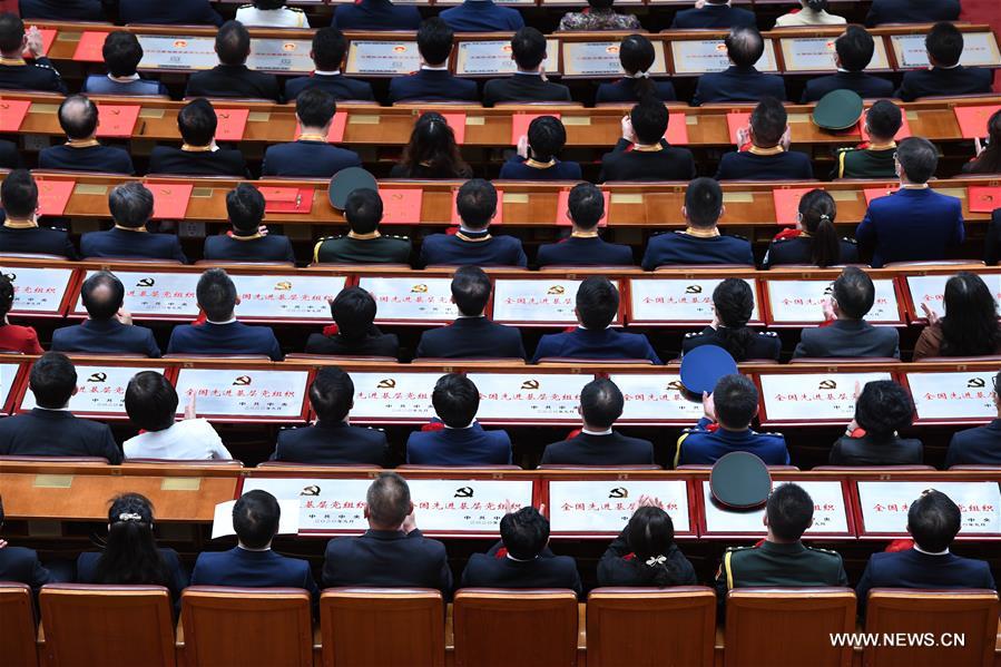 الصين تعقد اجتماع تكريم نماذج يحتذى بها في محاربة كوفيد-19
