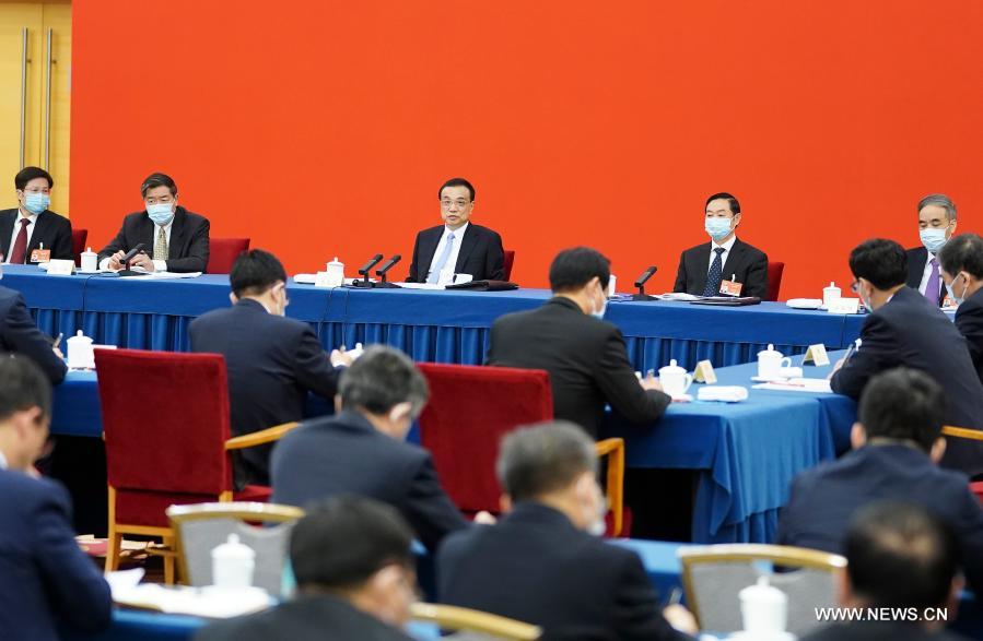 قادة صينيون ينضمون إلى مناقشات مع مستشارين سياسيين