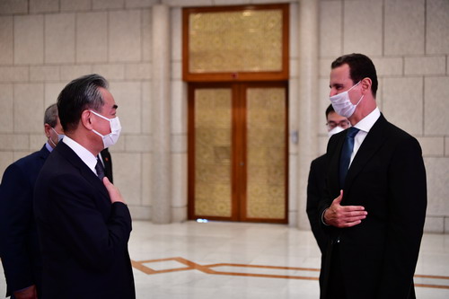 مستشار الدولة وزير الخارجية وانغ يي يلتقي مع الرئيس السوري بشار الأسد