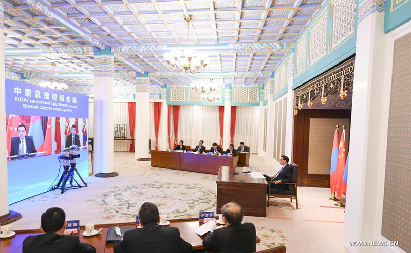 الصين ومنغوليا تتعهدان بتعزيز التعاون
