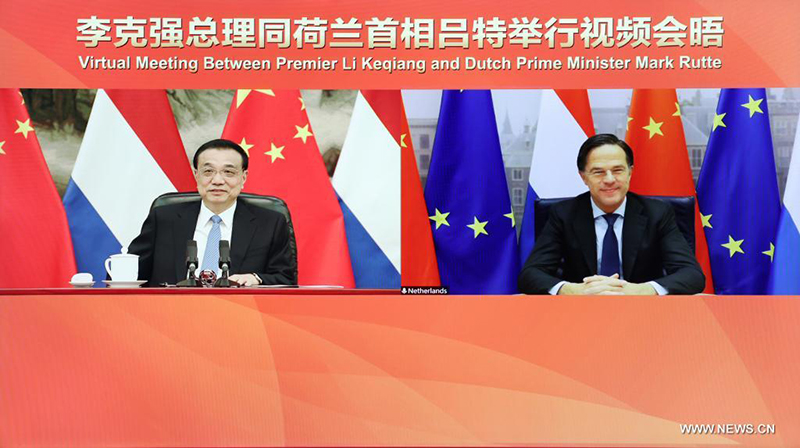 الصين وهولندا تتعهدان بتعزيز التعاون