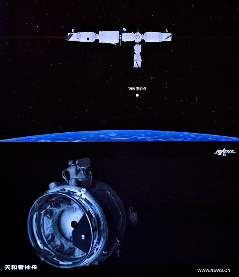 المركبة الفضائية الصينية المأهولة شنتشو-14 تلتحم مع مجموعة محطة الفضاء
