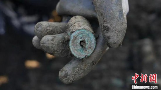 علماء آثار يعثرون على 1.5 طن من العملات المعدنية في مقاطعة جيانغسو
