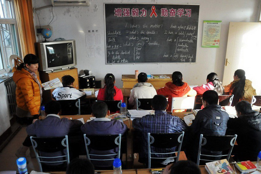 صور عالية الوضوح:زيارة إلى المدرسة الوحيدة لرعاية الأطفال المصابين بالإيدز فى الصين