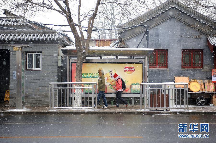الثلوج الكثيفة تهطل على بكين  (14)