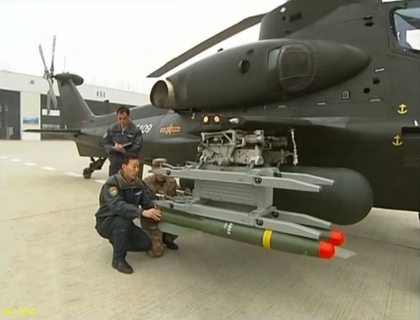 الكشف عن أول صور تظهر المروحية الحربية تشي-10 وهي  تحمل صواريخ مضادة للدبابات (11)