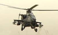   المروحية الحربية تشي-10 وهي تحمل صواريخ مضادة للدبابات
