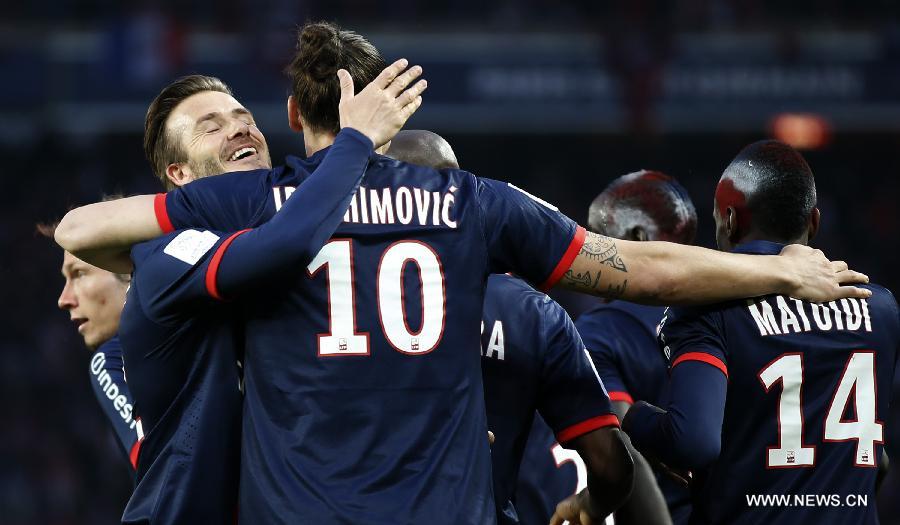 ديفيد بيكهام يحتفل بعد تتويج باريس سان جرمان بلقب الدوري الفرنسي (13)