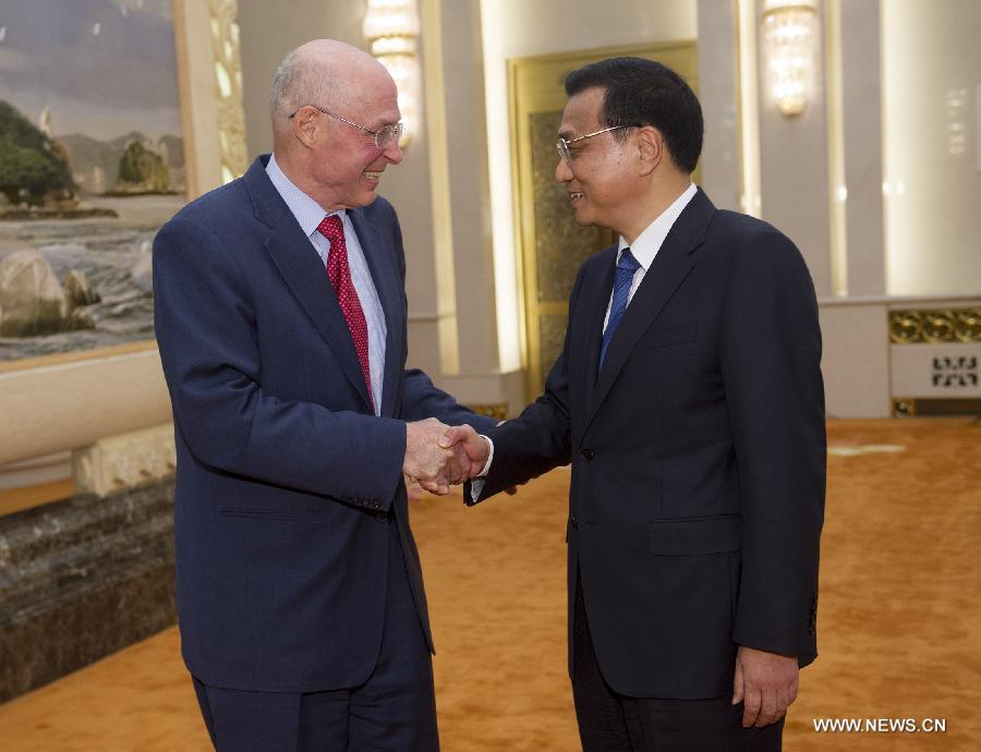 رئيس مجلس الدولة الصينى يجتمع مع وزير الخزانة الأمريكى السابق