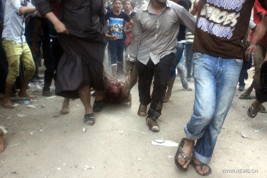 تقرير إخباري: غضب رسمي وشعبي بعد مقتل أربعة مصريين من الشيعة على خلفية طائفية (3)