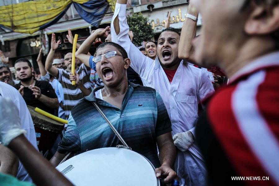 تقرير إخباري: أنصار مرسي يواصلون احتجاجتهم في جمعة "مصر ضد الانقلاب" ويفشلون في نقل الاعتصامات لمناطق جديدة (3)