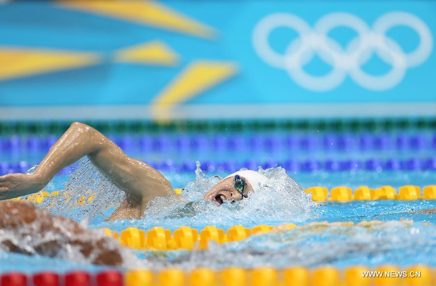 الصيني سون يانغ يفوز بذهبية سباق سباحة 1500 م حرة رجال ليحقق رقما قياسيا عالميا جديدا