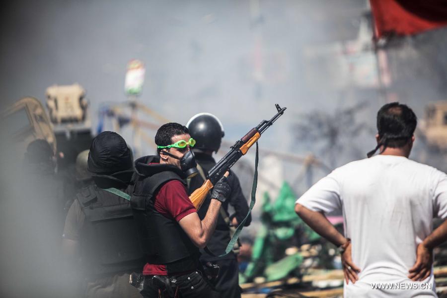 التليفزيون المصري: قوات الأمن تسيطر بالكامل على ميدان رابعة العدوية (16)