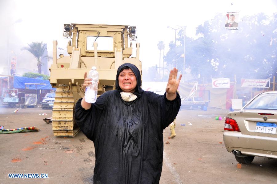 التليفزيون المصري: قوات الأمن تسيطر بالكامل على ميدان رابعة العدوية (12)