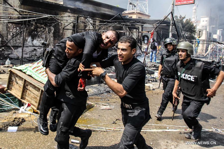 التليفزيون المصري: قوات الأمن تسيطر بالكامل على ميدان رابعة العدوية