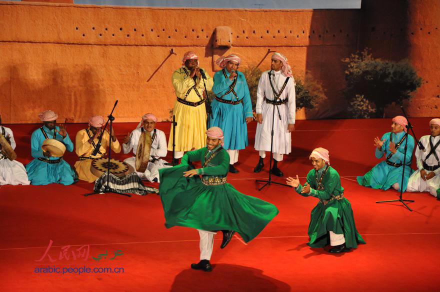 إفتتاح فعاليات السعودية في معرض بكين الدولي للكتاب 2013 بعرض فلكلوري سعودي 