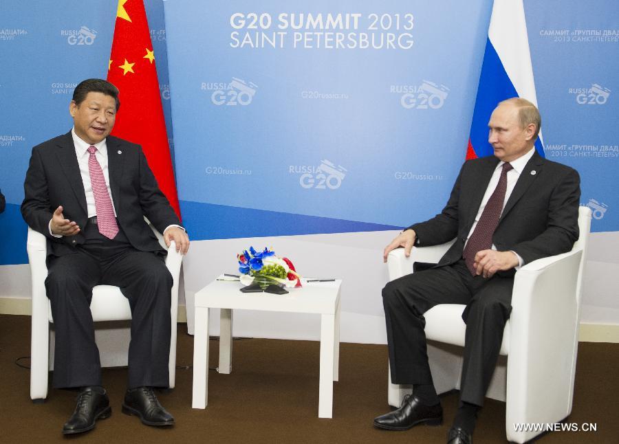 الرئيس الصينى يبحث العلاقات الثنائية والقضايا العالمية مع نظيره الروسى