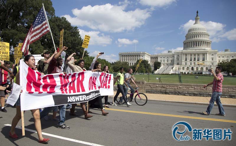 متظاهرون أمريكيون يحثون الكونجرس على رفض الهجوم العسكري ضد سوريا  (5)