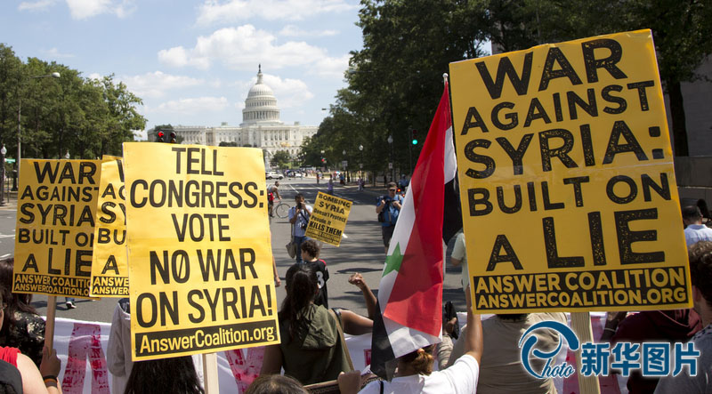 متظاهرون أمريكيون يحثون الكونجرس على رفض الهجوم العسكري ضد سوريا  (4)