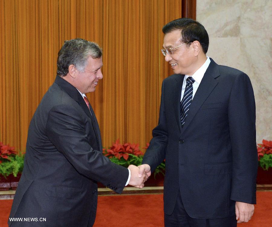 رئيس مجلس الدولة الصيني يجتمع مع العاهل الاردني