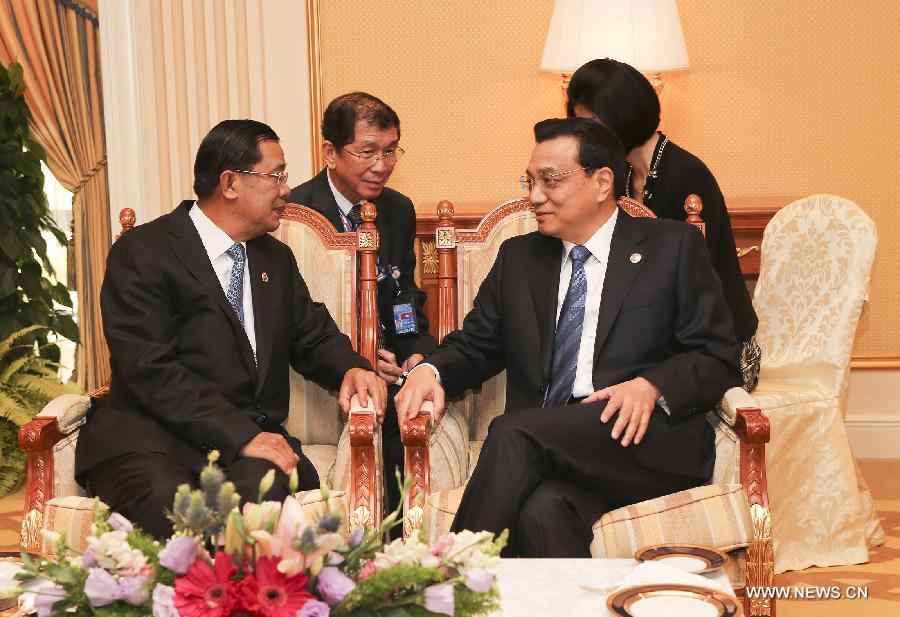 رئيس مجلس الدولة الصيني يجتمع مع قادة كوريا الجنوبية واندونيسيا وكمبوديا ونيوزيلاندا  (4)