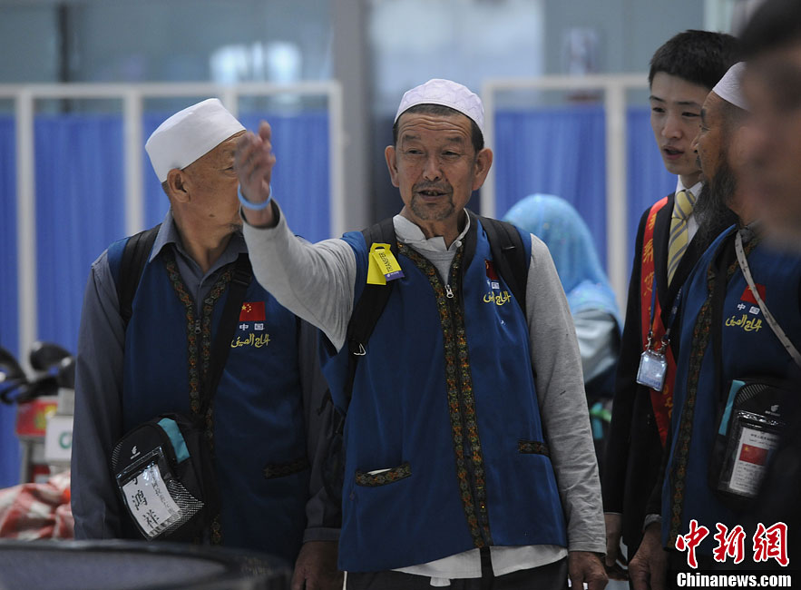 عودة المسلمين الصينيين المتوجهين إلى السعودية للحج  (5)