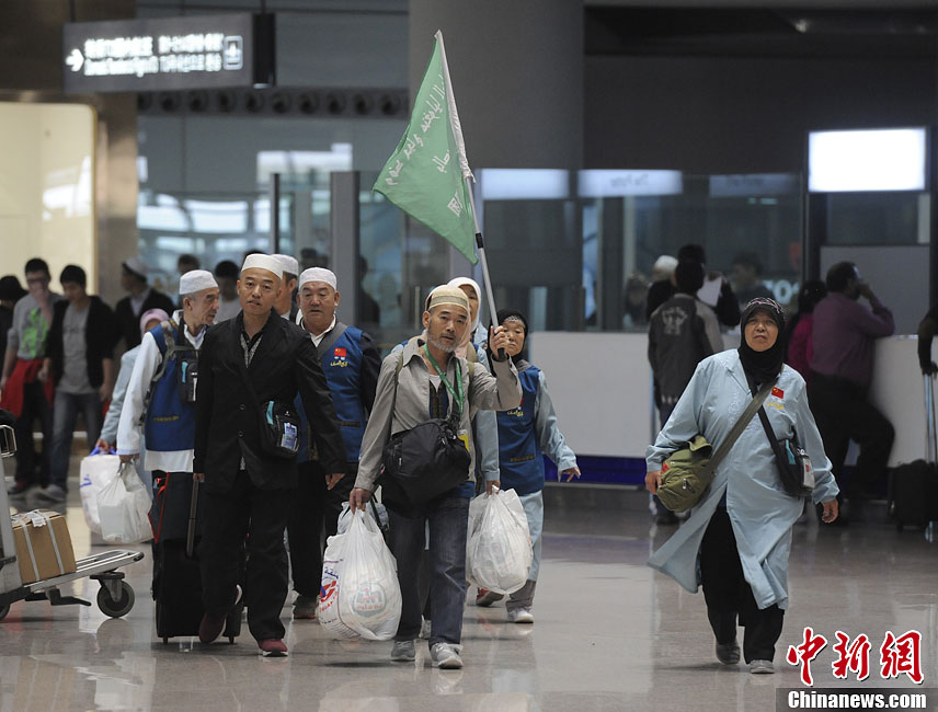 عودة المسلمين الصينيين المتوجهين إلى السعودية للحج  (8)