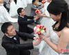 إقامة حفل زفاف جماعي فى تشينغدو بمناسبة "عيد العزاب" 