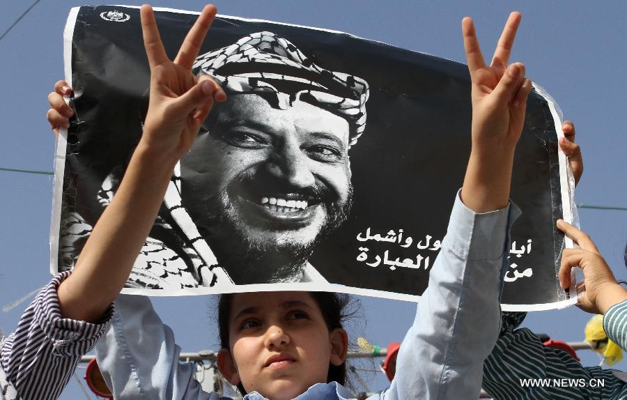 تقرير إخباري: الفلسطينيون يحيون الذكرى التاسعة لوفاة عرفات بالتأكيد على التمسك بثوابته (4)